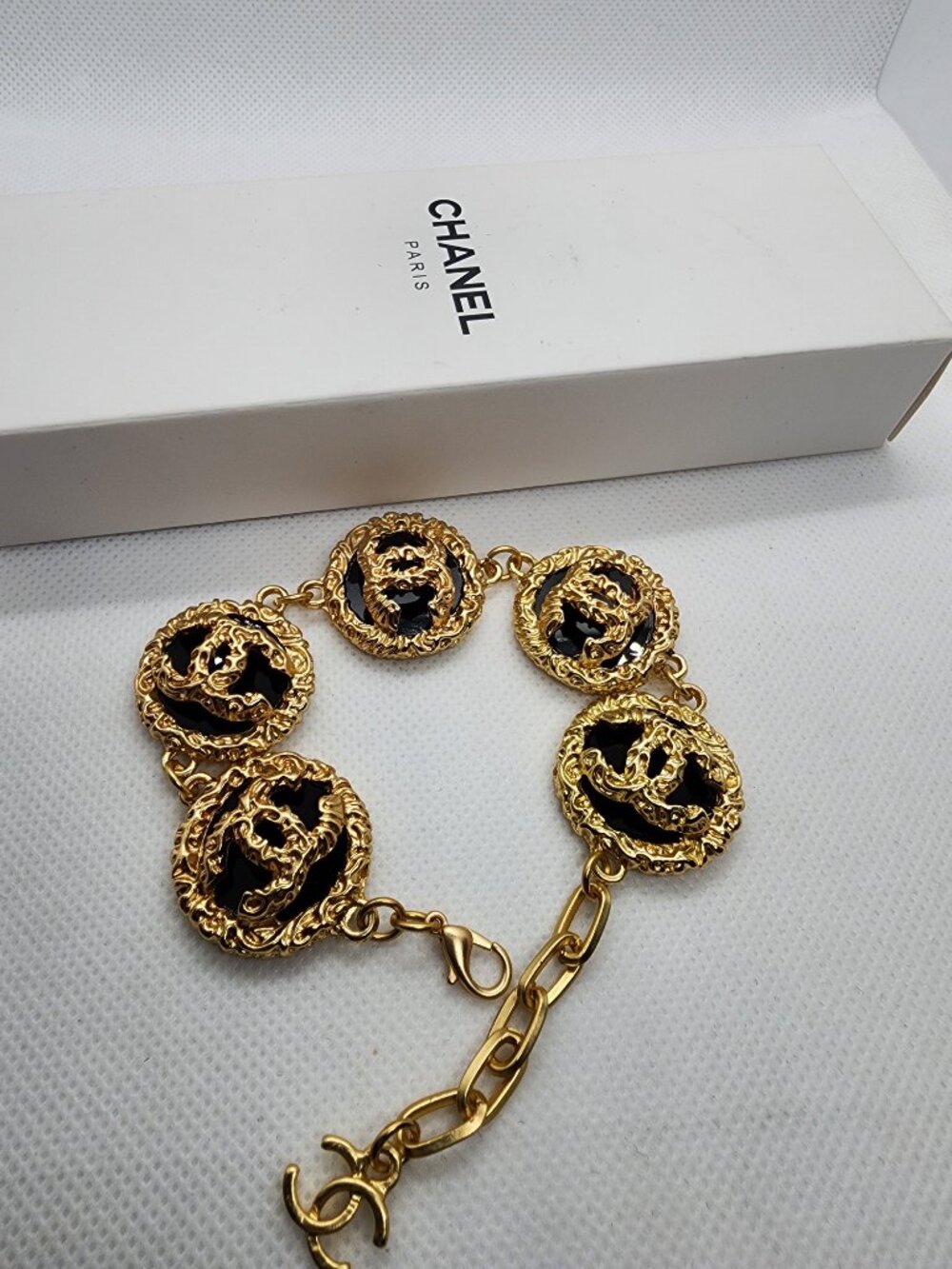 CHANEL Gold and Black Emblem Bracelet - Exclusive -